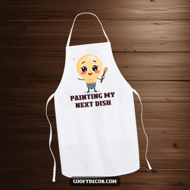 Funny apron featuring a lightbulb character with a paintbrush, designed for artistic protection during creative activities.