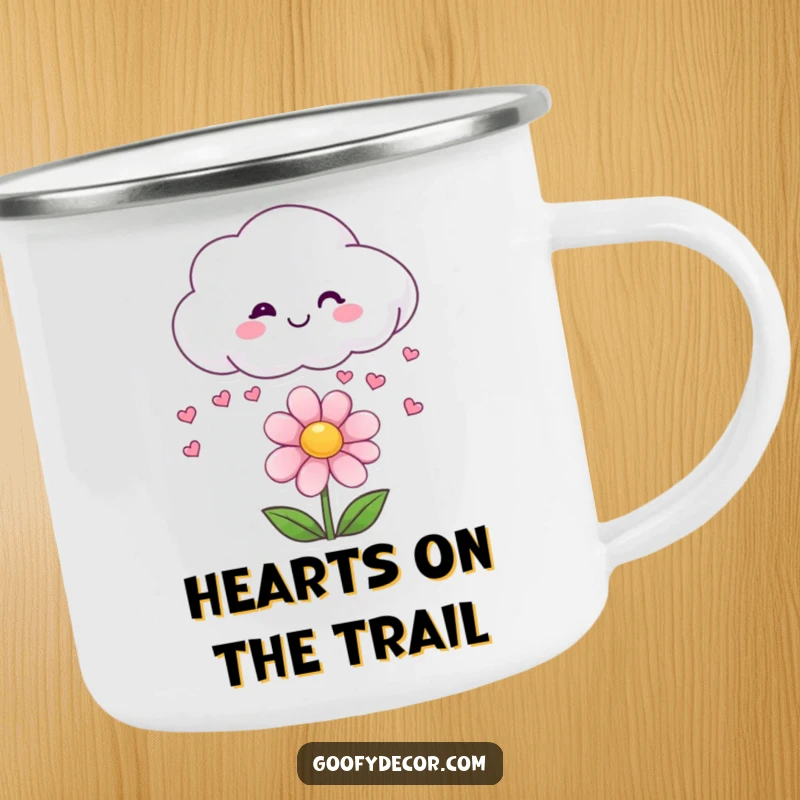 Funny camping mug showing a smiling cloud raining small hearts onto a happy flower.