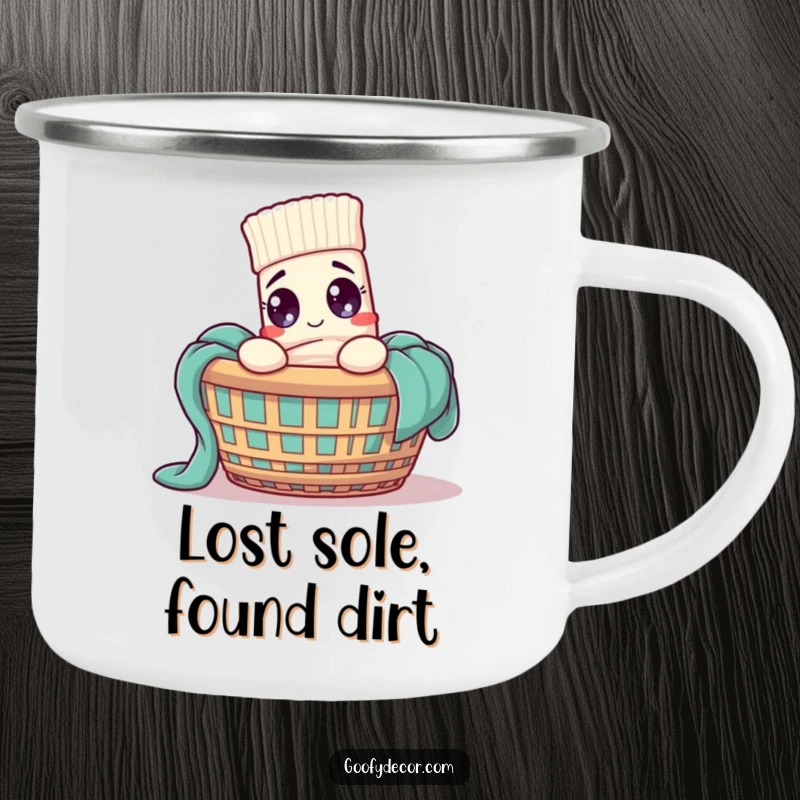Funny sock character in a laundry basket, looking ready for adventure, on an enamel camping mug.