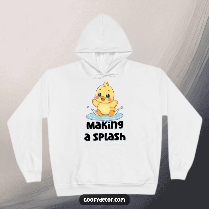 Funny, cheerful duckling character splashing happily in a puddle, featured on a cozy hoodie for ultimate comfort.