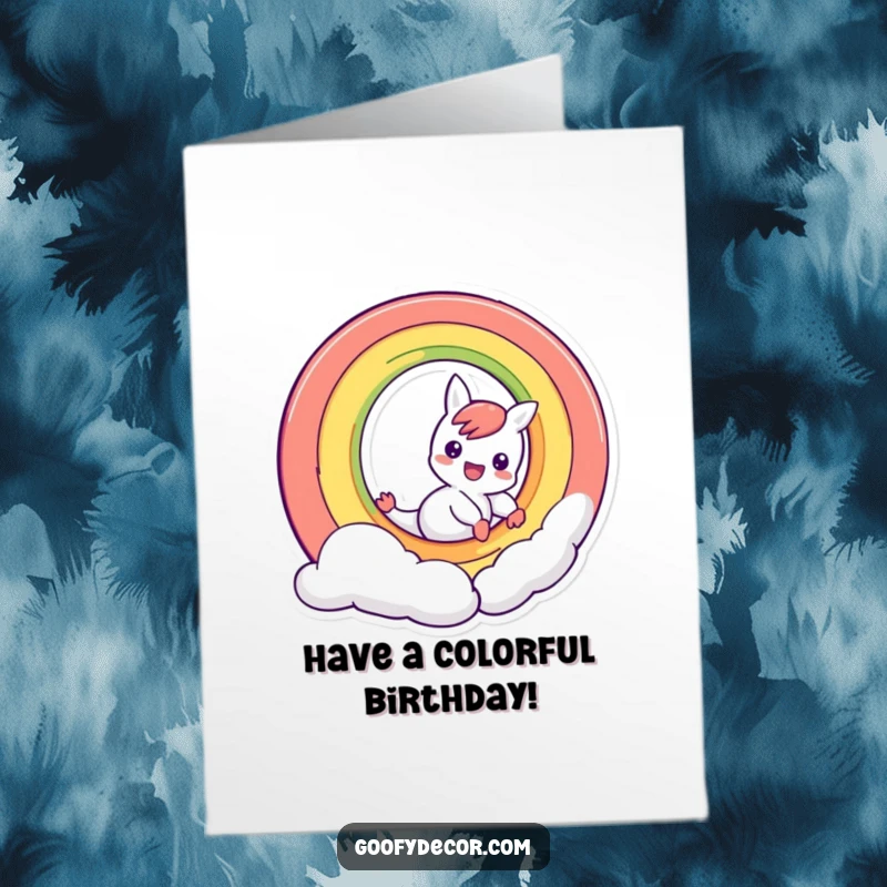 Funny Free Printable Birthday Card: A mischievous rainbow character joyfully sliding down its own colorful arc, celebrating a birthday.
