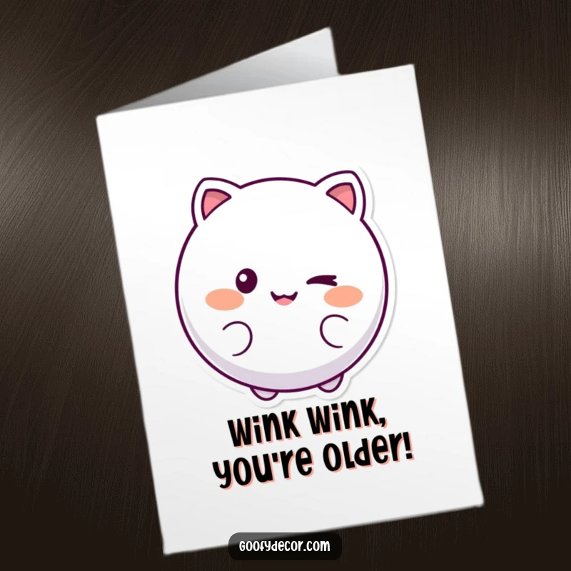 Funny Free Printable Birthday Card featuring a round, smiling character giving a playful wink, ready for your DIY greeting.