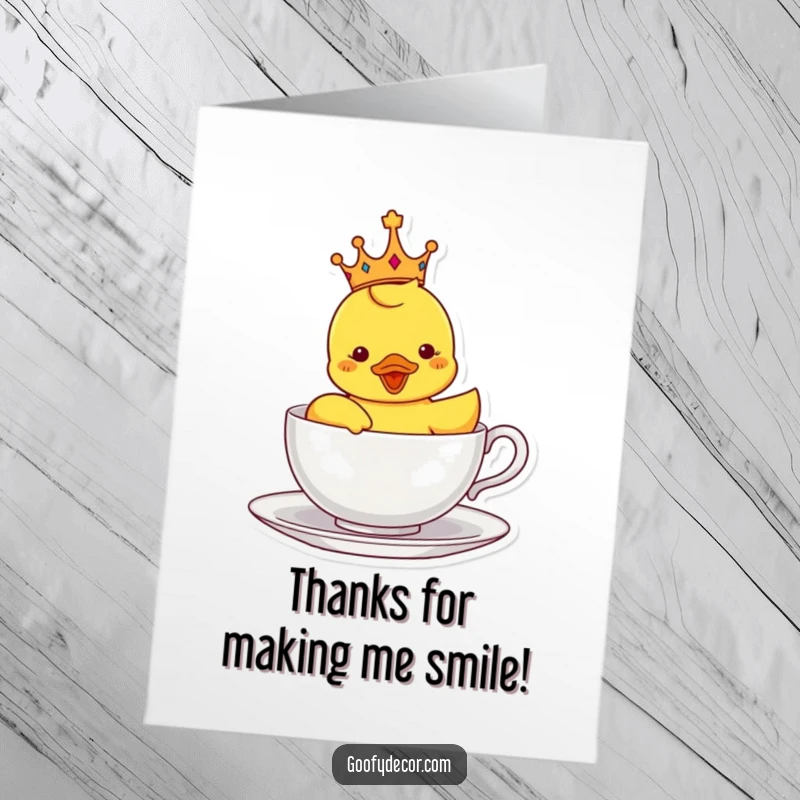 Funny free printable thank you card: Delighted crowned rubber ducky sailing in a teacup, conveying royal gratitude.