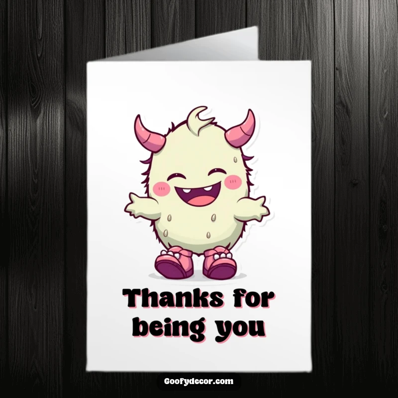 Funny Free Printable Thank You Card: A cute kawaii monster chuckles, celebrating with its delightfully mismatched shoes.