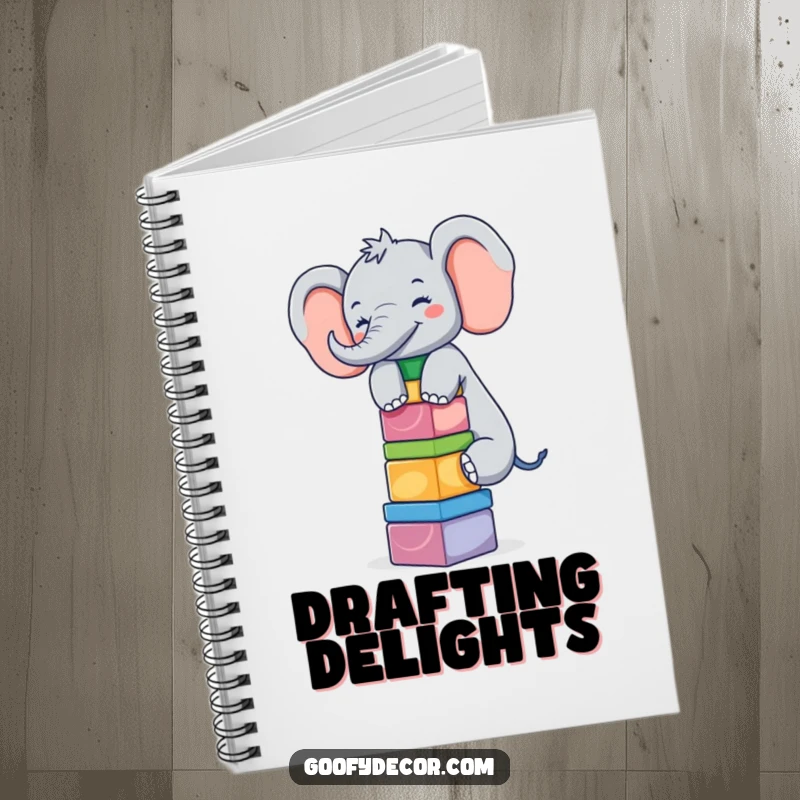 Funny giggling elephant balancing blocks on a notebook cover, a humorous and practical journal.