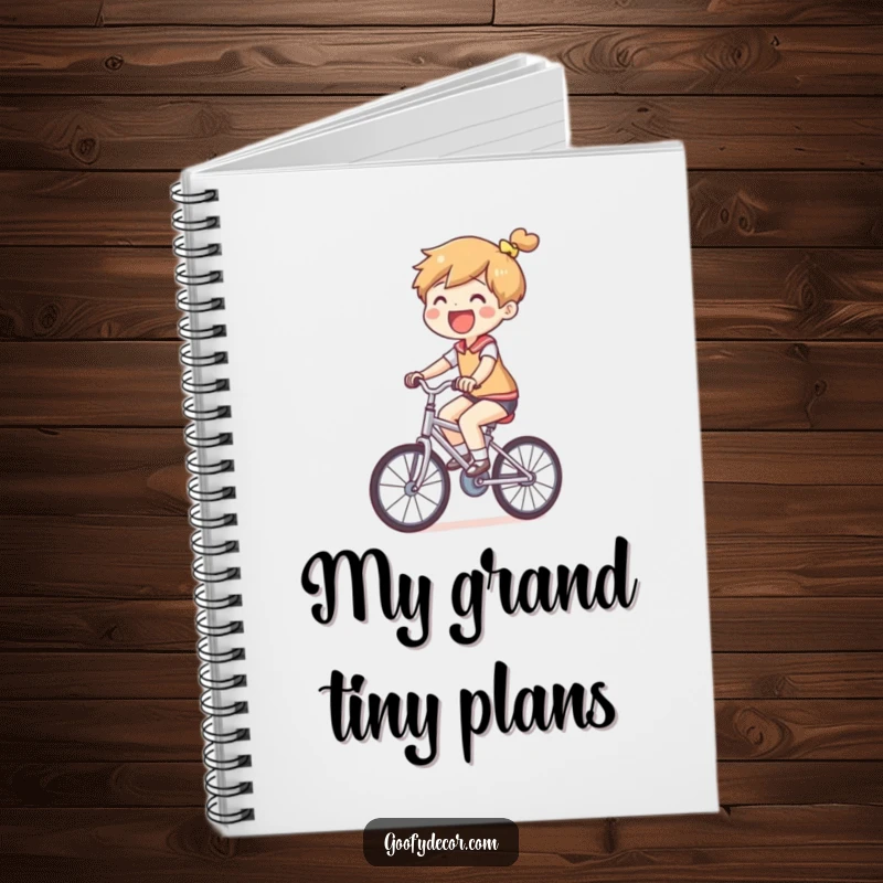 Funny Small Bicycle Notebook featuring a joyful character riding a comically small bicycle, perfect for jotting down ideas.