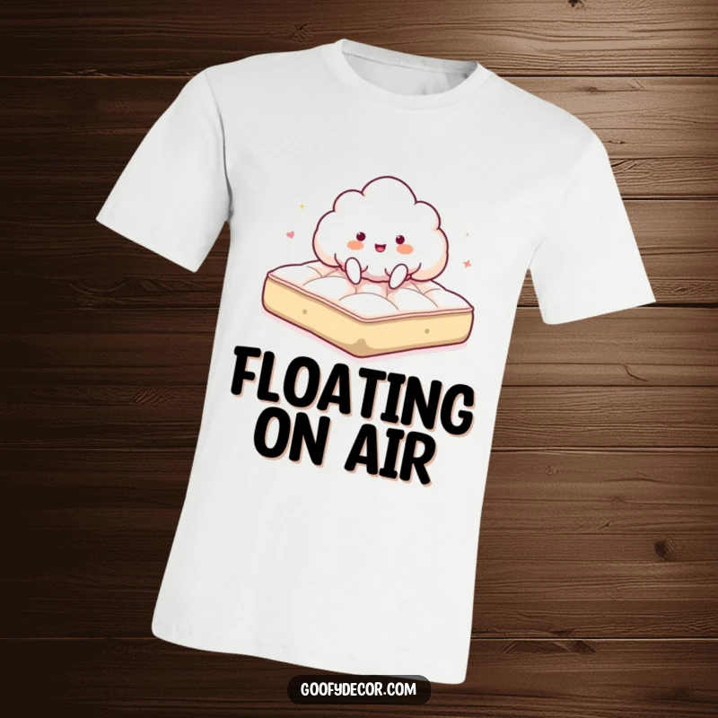 Funny t-shirt featuring a giddy cloud character joyfully bouncing high on a fluffy mattress, radiating happiness.