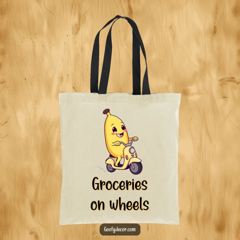Funny tote bag with a grinning banana riding a scooter, perfect for errands and bringing smiles.