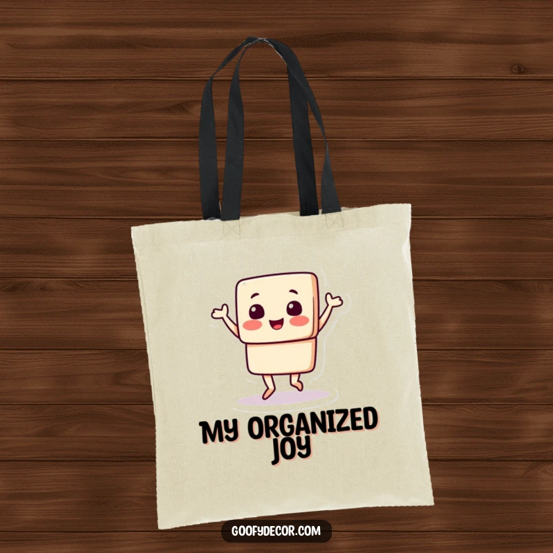 Funny tote bag depicting a square character enthusiastically doing a happy jig, ready to carry your essentials with a dose of cheerful energy.